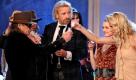 Rockmusiker Udo Lindenberg (v.l.), Moderator Thomas Gottschalk, Saengerin Josephin Busch und Co-Moderatorin Michelle Hunziker stossen am Samstag (12.02.11) bei Wetten, dass..? in Halle mit Eierlikoer an. Wie Moderator Thomas Gottschalk am Samstagabend bei der Jubilaeumssendung zum 30-jaehrigen Bestehen der Unterhaltungsshow in Halle ankuendigte, wird die Sommerausgabe aus Mallorca am 18. Juni seine letzte sein. Der 60-jaehrige Entertainer zieht damit die Konsequenz aus dem tragischen Unfall von Samuel Koch in der Sendung am 4. Dezember vergangenen Jahres. (zu dapd-Text) Foto: Jan Woitas/Pool/dapd Foto: ddp