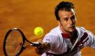 Der Rumäne Adrian Ungur schlägt sich bei den Mexican Open Tennismeisterschaften in Acapulco so gut er kann gegen David Ferrer aus Spanien. Foto: dpa