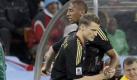 Germany's Marcell Jansen, right, replaces Germany's Jerome Boateng during the World Cup group D soccer match between Ghana and Germany at Soccer City in Johannesburg, South Africa, Wednesday, June 23, 2010. (AP Photo/Gero Breloer) Foto: ap