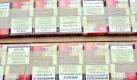 Ein undatiertes Handout-Foto des Zollfahndungsamtes Hannover zeigt zwischen Holzbrettern geschmuggelte Zigaretten-Packungen. Foto: Zollfahndungsamt Hannover Foto: dpa