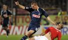 Lukas Podolski (li.) bleibt gegen den Mainzer Marcel Risse zweiter Sieger. Foto: ap