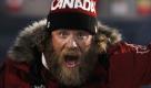 A Canadian athlete lets out a yell during the opening ceremony for the Vancouver 2010 Olympics in Vancouver, British Columbia, Friday, Feb. 12, 2010. (AP Photo/Mark Baker) Foto: ap