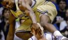 Duke's Miles Plumlee (21) is faced by Georgia Tech's Gani Lawal during the second half of an NCAA college basketball game in Durham, N.C., Thursday, Feb. 4, 2010. Lawal received a technical foul. Duke won 86-67.  (AP Photo/Sara D. Davis) Foto: ap