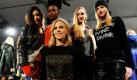 Designerin Tory Burch (Mitte) posiert mit Models und Entwürfen ihrer Herbst-Kollektion auf der Fashion Week in New York. Foto: ap