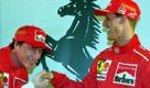 Der Ire Eddie Irvine (l.) hatte es als Teamkollege von Michael Schumacher ebenfalls schwer. Von 1995 bis 2000 fuhr er für die Italiener. Im Jahr 1996 stieß der Kerpener zur Scuderia und wurde zur unumstrittenen Nummer Eins, was der impulsive Ire nicht immer verstehen wollte. Drei Siege konnte er in dieser Zeit erringen. Foto: dpa