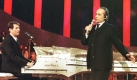 Der spanische Tenor Jose Carreras (r) und der Sänger Udo Jürgens am Samstag (20.12.1997) in Leipzig während der Generalprobe zur Benefiz-Gala zugunsten Leukämieerkrankter. Mit Hilfe vieler Weltstars werden während einer Fernseh-Direktübertragung der Gala, die unter dem Motto 'Gib nicht auf' steht, am Samstag abend bundesweit Spenden für die Deutsche Jose-Carreras- Leukämie-Stiftung gesammelt. Carreras war selbst an Leukämie erkrankt und hatte 1988 die internationale Stiftung gegründet. Foto: dpa