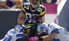 Green Bay Packers' Jordy Nelson (87) runs between Detroit Lions' John Wendling and Isaiah Ekejiuba (50) during the first half of an NFL football game Sunday, Oct. 3, 2010, in Green Bay, Wis. (AP Photo/Mike Roemer) Foto: ap