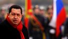 Der venezolanische Präsident Hugo Chavez betrachtet kurz nach seiner Ankunft am Regierungsflughafen Vnukovo II außerhalb Moskaus eine Ehrengarde. Der offizielle Besuch in Russland ist Teil seiner zwölftägigen Reise durch mehrere Länder der Welt. Foto: dapd