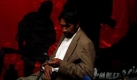 A former guerrilla fighter who did not want to be identified uses his cell phone as he waits for a ceremony to begin in honor of four late alleged guerilla fighters whose remains were recently excavated, at the Bolivian Human Rights Assembly building in La Paz, Thursday, Sept. 24, 2009. Argentine anthropologists discovered the remains of nine alleged guerilla fighters during their search for people who disappeared during Bolivia's guerilla movements in the 70's and 80's that fought against Bolivia's military dictatorships, according to the Justice Ministry. (AP Photo/Dado Galdieri) Foto: ap