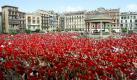 Thousands of people wave red scarfs after the traditional 'txupinazo' in Pamplona, Spain, 06 July 2010. The txupinazo marks the beginning of the San Fermin bull run festival with the setting off of a rocket from one of the windows of the city hall. The festival runs until 14 July.
 Foto: dpa