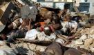 A picture dated 16 January 2010 shows bodies spill out into the street from Haiti's National Cemetery, in Port au Prince, Haiti. The End of World starts at Puerto Principe's cementery. WILLIAM B PLOWMAN/dpa (USA OUT/ NO SALES -ATTENTION EDITORS: GRAPHIC CONTENT) +++(c) dpa - Bildfunk+++ Foto: dpa