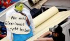 Ein IG Metall-Mitglied befestigt eine Puppe mit Schriftzug auf einer Barkasse im Hamburger Hafen. Auf einer Kundgebung am Hafen mit anschließender Barkassen-Demo haben heute in Hamburg Metallerinnen und Metaller gegen die Sparpolitik der Bundesregierung protestiert. Foto: dpa