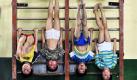 Schüler der Shenyang Specialized Gymnastic School trainieren an der Sprossenwand, in Shenyang (China). Ungefähr 86 Schüler zwischen fünf und vierzehn Jahren durchlaufen ein sieben bis zehn Jahre dauerndes intensives Gymnastiktraining, in der Hoffnung, im Anschluss in das nationale Gymnastik-Team aufgenommen zu werden. Foto: dpa