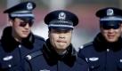 Polizisten in Peking. Wer für die Bürgerrechte auf die Straße geht, lebt unter der Herrschaft der kommunistischen Partei gefährlich.  Foto: dpa