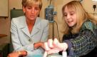 Cystic fibrosis sufferer Nicky Welsh (R) points to her daily pill intake during a chat with Diana, Princess of Wales, during the Princess' visit at the Royal Brompton Hospital in London's Fulham district, 15 April, where the Princess made a visit to highlight the Cystic Fibrosis Week. dpa COLORplus  Foto: dpa