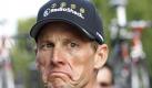 Der siebenmalige Sieger der Tour de France, Lance Armstrong, verzieht nach seiner Ehrenrunde nach der Abschlussetappe das Gesicht. Für Armstrong war es der letzte Start bei der Frankreich-Rundfahrt. Foto: dpa