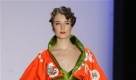 A model presents a creation from the collection by fashion designer Guido Maria Kretschmer during the Mercedes Benz Fashion Week, Mode Woche, in Berlin, on Saturday, Jan. 31, 2009 (AP Photo/Markus Schreiber) ** EDITORIAL USE ONLY ** Foto: ap