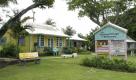 This undated photo courtesy of Barbados Tourism Authority shows The Chattel Village Holetown shops.  Some chattels, or movable property, serve as homes and some serve as shops selling T-shirts, beachware and gifts.    (AP Photo/Barbados Tourism Authority) NO SALES Foto: dapd