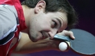 Timo Boll schneidet den Ball im Spiel gegen den Südkoreaner Jung Young Sik an. Foto: dpa