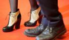 Deren Schuhe für ein amüsantes Bild an diesem Abend sorgten.
 Foto: ddp