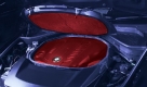 Die Lösung klingt ebenso einfach wie verblüffend: Die BMW-Ingenieure haben das Aggregat völlig eingekapselt, dem Motor gewissermaßen einen Mantel angezogen. Durch diese Kapselung kühlt ein 80 Grad Celsius warmer Motor nach der Fahrt wesentlich langsamer ab. Foto: press-inform