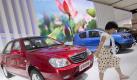 Die chinesische Automarke Geely präsentiert sich auf einer Messe in Peking. Auf dem internationalen Markt spielen Hersteller wie Geely. FAW und Dongfeng derzeit kaum eine Rolle. Foto: How Hwee Young  Foto: dpa