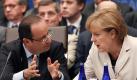 Der französische Präsident Hollande im Gespräch mit Kanzlerin Angela Merkel. Foto: Kamil Krzaczynski Foto: dpa