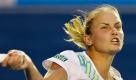 Australia's Jelena Dokic makes a return to Russia's Dinara Safina during their women's singles match at the Australian Open Tennis Championship in Melbourne, Australia, Tuesday, Jan. 27, 2009. (AP Photo/Rob Griffith) Foto: ap