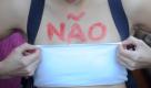epa02785116 A woman take part in a 'slutwalk' protest, in Brasilia, Brazil 18 June 2011 to protest against sexual violence and sexism. At the same time another march to legalize marijuana was taking place and the two rallies merged. SlutWalk is an international campaign that originated in Toronto, Canada, after a representative of the local Police Force stated that 'women should avoid dressing like sluts in order not to be victimized'. EPA/Fernando Bizerra Jr. +++(c) dpa - Bildfunk+++  Foto: dpa