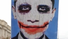 Demonstranten tragen ein Plakat, das US-Präsident Barack Obama als Joker zeigt, den bösen Antihelden aus den Batman-Filmen. Sie protestieren gegen die geplante Gesundheitsreform, die eine Krankenversicherung für alle Amerikaner und ein besseres Gesundheitssystem bringen soll - für Obamas Gegner fängt damit schon der Sozialismus an. Foto: dpa
