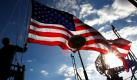 Ein Rekrut der US-Navy hisst auf der USS George Washington die Stars-and-Stripes-Flagge auf dem Pazifischen Ozean. Ende Januar und im Februar wird es weitere gemeinsame Übungen der japanischen und der amerikanischen Marine in Japan geben. Gerade verständigten sich die USA und China auf das Vorhaben, ihre Truppen gemeinsam zu stärken.  Foto: dapd