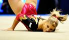 Elisabeth Seitz turnt keine komplizierte Bodenübung, sondern eine missglückte Figur am Reck. Die Vize-Europameisterin ist bei der Übung im Finale des Teamwettbewerbs auf der Matte gelandet und damit auf dem sechsten Platz. Schon nach dem Vorkampf hatten die Turn-Damen die Olympiaqualifikation in der Tasche - ein Riesenerfolg. Foto: dapd