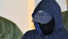 Alex W. trat nur vermummt vor die Kameras. Foto: dpa