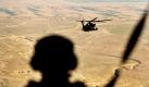 Ab diesem Samstag werden die regionalen Behörden in Masar-i-Scharif selbst für die Sicherheit der Provinzhauptstadt verantwortlich sein, in deren Nähe das größte deutsche Feldlager in Afghanistan steht. Auf dem Bild sitzt ein Bundeswehr-Soldat der Internationalen Schutztruppe für Afghanistan an der Ladeklappe eines Transporthubschraubers. Foto: dapd