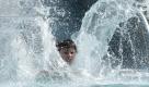 Der 10-jährige Deniz rutscht im Münchener Schyrenbad eine Wasserrutsche hinab. Früher als geplant hat in der bayerischen Landeshauptstadt das erste Freibad der Saison eröffnet. Das Wetter bietet in Süddeutschland über die Osterfeiertage bestes Freibadwetter bei Temperaturen bis zu 25 Grad Celcius und Sonnenschein.
 Foto: dapd