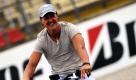 Selbst beim Radfahren legt er Wert auf Motorenantrieb: Der Mercedes-GP-Petronas-Pilot Michael Schumacher fährt die Formel-1-Rennstrecke des Großen Preises von Deutschland auf dem Hockenheimring auf einem Elektrofahrrad ab. Spätestens beim Rennen am Sonntag steigt der Rennfahrer dann aber ins Auto um. Foto: ddp