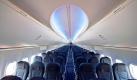 Ein Blick in den neugestalteten Innenraum einer Boeing 737-700 in Berlin-Tegel. Die Fluggesellschaft Air Berlin stellte am Vormittag die weltweit erste Boeing 737-700 mit dem neuen Kabinendesign Sky Interior vor. Die Neuerungen umfassen ovalere Fenster, hellere Seitenverkleidungen sowie Deckenbeleuchtung in wechselnden Farben. Foto: dpa