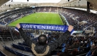 Ein Fan hlt whrend der Erffnung seinen Hoffenheim-Schal. Foto: dpa