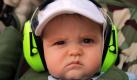 A very young spectator with race-caps and ear protection is seen in the paddock at the newly built racetrack Yas Marina Circuit in Abu Dhabi, United Arab Emirates, 01 November 2009. Photo: DIEGO AZUBEL +++(c) dpa - Bildfunk+++ Foto: dpa