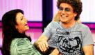 Die Schauspielerin Christine Neubauer greift im nobeo Fernsehstudio in Hürth bei Köln in der RTL- Fernsehshow Typisch Frau - Typisch Mann dem Comedian Atze Schröder mit einer eisig kalten Hand unter`s Shirt.  Die Sendung wird auf RTL am Freitag ausgestrahlt. Foto: dapd