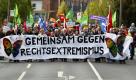 Teilnehmer einer Demonstration unter Führung des Ministerpräsidenten Mecklenburg-Vorpommerns protestieren in Greifswald gegen einen NPD-Aufmarsch in der Hansestadt. Mehrere Tausend Demonstranten sind am Sonntag in Greifswald zu einem Demokratiefest gegen einen geplanten Aufmarsch der rechtsextremen NPD zusammengekommen. Foto: dapd