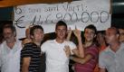 People celebrate outside the Biffi's Cafe where the winning ticket for the SuperEnalotto was bought for two euros by an as yet unknown punter in Bagnone, Tuscany region, Italy on 22 August 2009. The winning ticket in Italy?s state lottery collects a 146.9 million euro or 209.8 million US dollar jackpot prize.
 Foto: dpa