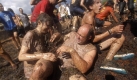 Auf Mallorca bewirft man sich traditionell mit Trauben und suhlt sich dann im entstandenen Matsch. Foto: ap
