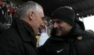 Mirko Slomka ist zurück. Vor seinem Debüt hat Hannovers neuer Coach (l.) auch noch gut lachen. Doch gegen die Mainzer von Thomas Tuchel (r.) gibt es eine Niederlage. Foto: ddp