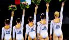 Das rumänische Frauenteam hat Grund zu feiern: Die fünf Turnerinnen holten Gold bei den Europameisterschaften in Brüssel. Foto: Robin Utrecht Foto: dpa