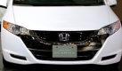 Szene von der 41. Tokioter Motorshow:Hondas Vize-Chef Takanobu Ito stellt den FCX Clarity vor. Obwohl Weiß als Autofarbe im Trend liegt, sieht es bei der diesjährigen Leistungsschau insgesamt düster aus. Nur drei Hersteller aus dem Ausland sind vor Ort. Foto: ap