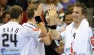 Handball EM-Qualifikation: Deutschland - Weißrussland am Mittwoch (17.06.2009) in der Porsche Arena in Stuttgart. Die Deutschen Michael Haaß (l) und Oliver Roggisch klatschen sich nach ihrem Sieg ab. Deutschland gewann das Spiel mit 38:27 Toren. Foto: Marijan Murat dpa/lsw +++(c) dpa - Bildfunk+++
 Foto: dpa