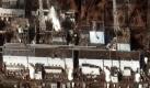 Satellitenaufnahme des Unglücksmeilers in Fukushima: Deutlich sichtbar sind die durch Exlosionen zerstörten Außenwände der Reaktoren. Foto: dpa