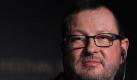 Lars von Trier bei der Pressekonferenz zu seinem Film Melancholia. Foto: dpa