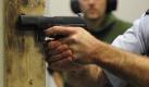 Ein Polizist (r.) trainiert am Mittwoch (14.04.10) in Wittlich im neuen Schiess- und Einsatztrainingszentrum der rheinland-pfaelzischen Polizei neben einem Ausbilder das Schiessen mit einer Pistole. Das Schiess- und Einsatztrainingszentrum wurde Ende 2009 in Betrieb genommen, ermoeglicht Polizisten voellig neue Methoden des Einsatztrainingsgenommen und ist nach Angaben des Innenministeriums bundesweit das modernste seiner Art. (weitere Bilder unter www.ddpimages.com) Foto: Torsten Silz/ddp Foto: dapd